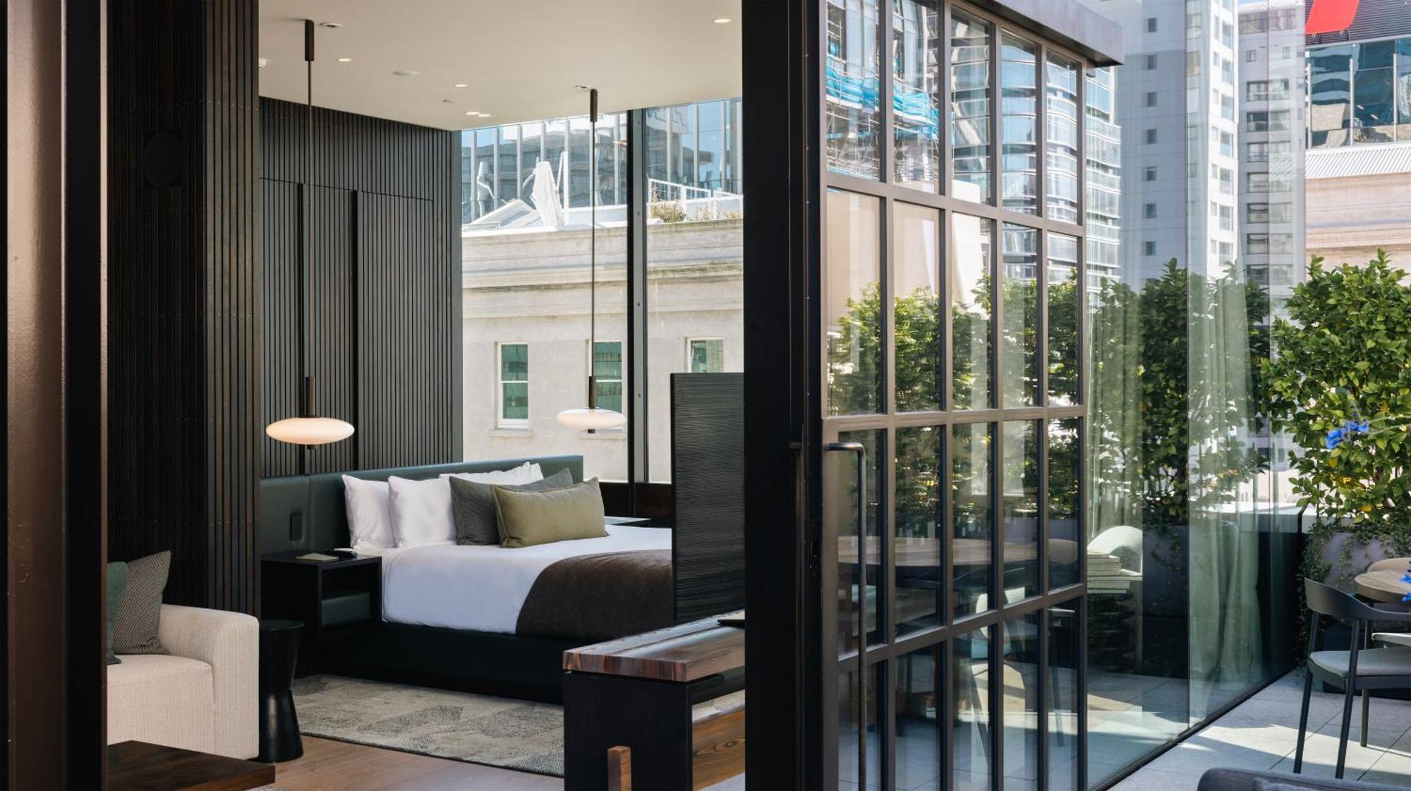 The Hotel Britomart Auckland Exterior photo The bedroom of a suite at The Hari